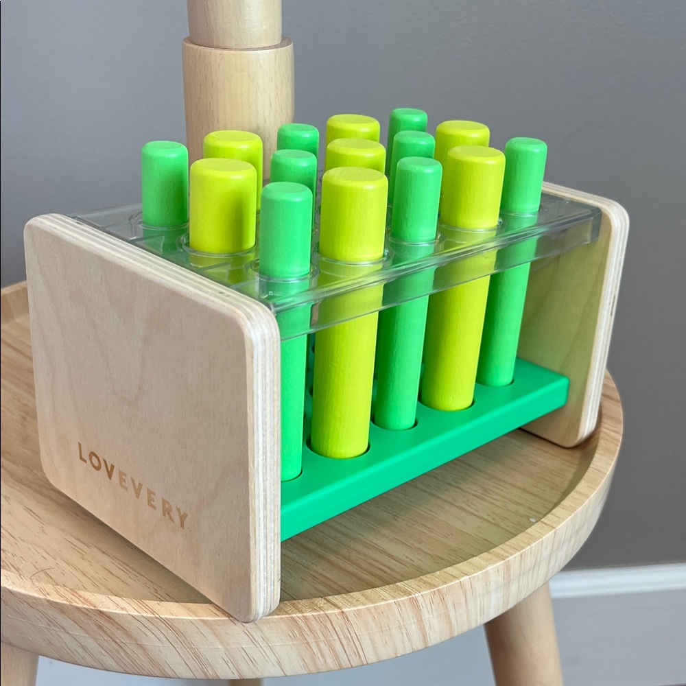 Lovevery Green & Yellow Peg Knock-Down Toy - Toddler Learning Playset